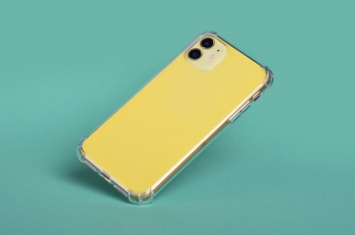 A yellow phone case on a blue background
Description automatically generated with low confidence